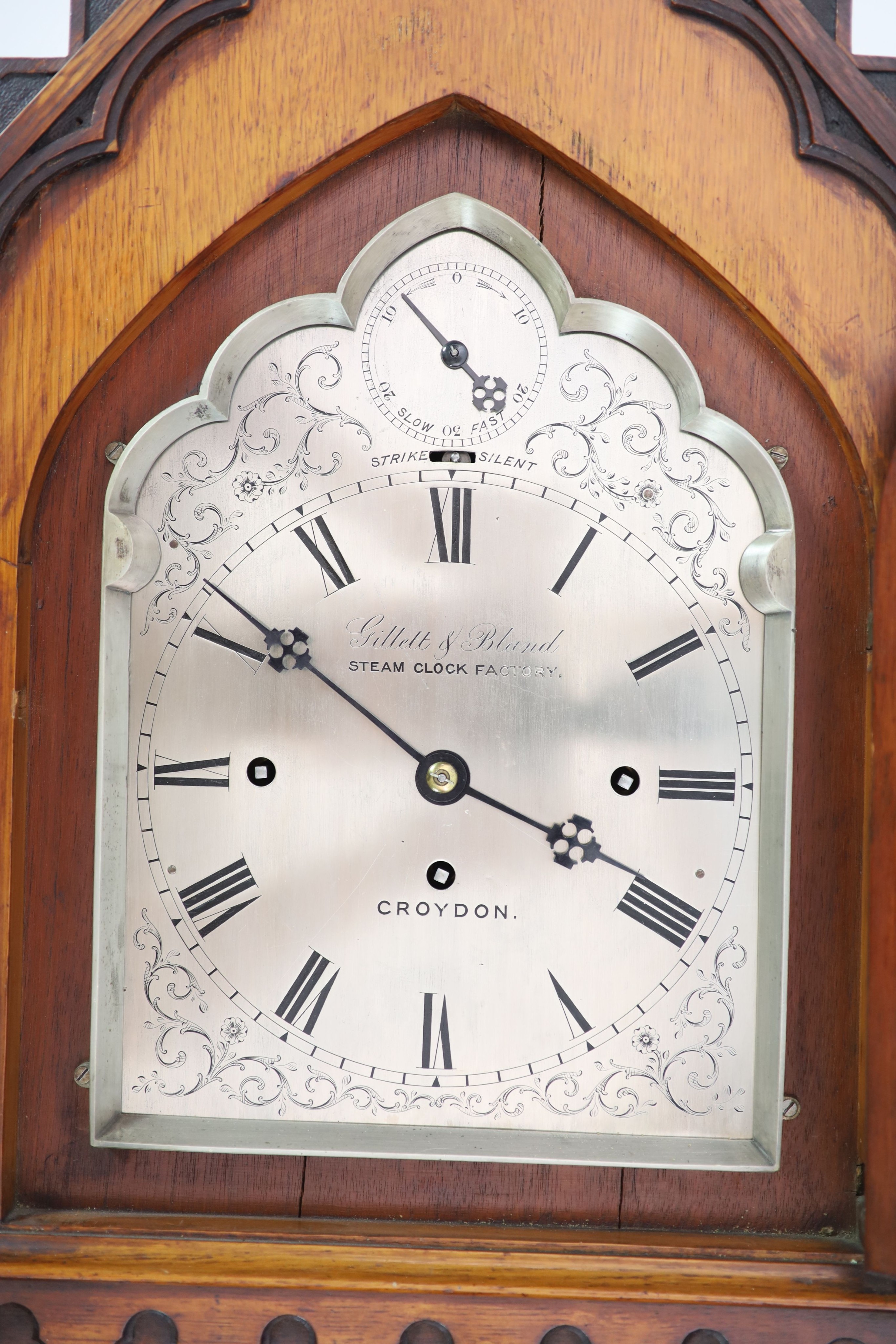 A Victorian golden oak Gothic design chiming bracket clock by Gillett & Bland, Steam Clock Factory, Croyden H 74cm. W 48cm. D 31cm.